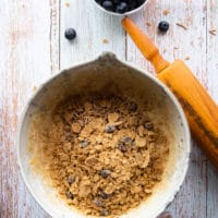crushed bran cereal added to the bowl of batter