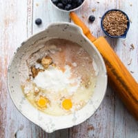 One bowl with all the ingredients for the bran muffins added in