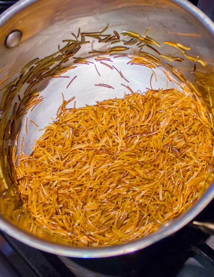 Golden toasted vermicelli in a pan