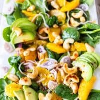close up of an orange salad plate