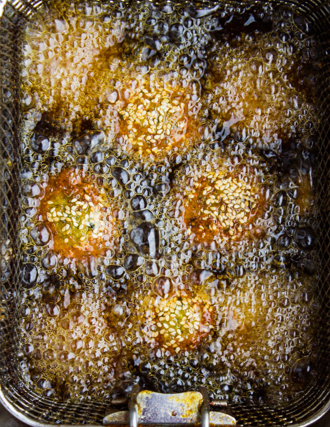 falafel deep frying in hot bubbling oil