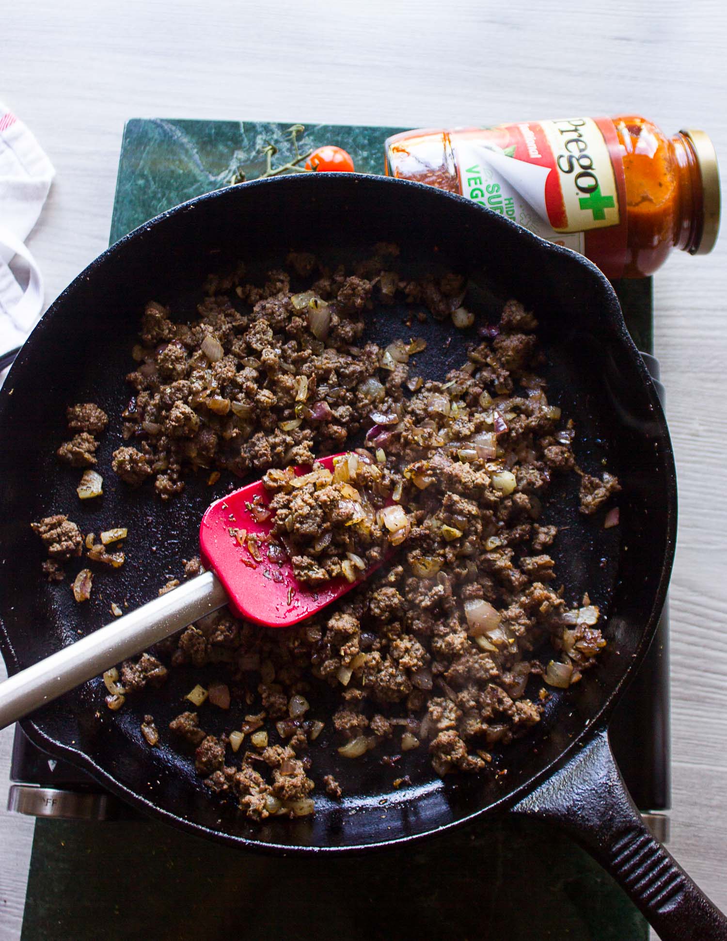 A mixture of ground beef cooked in a pan