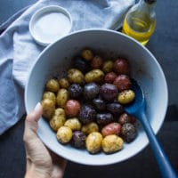 Seasoned potatoes in a bowl ready to air fry