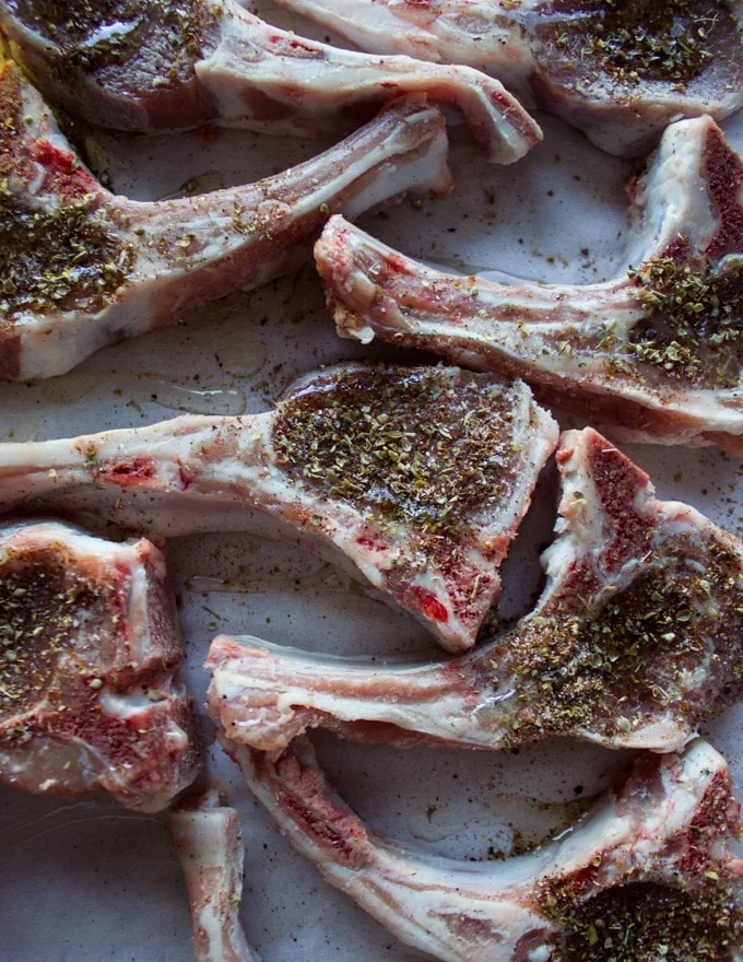 Lamb chops seasoned with the lamb seasoning and drizzled with oil