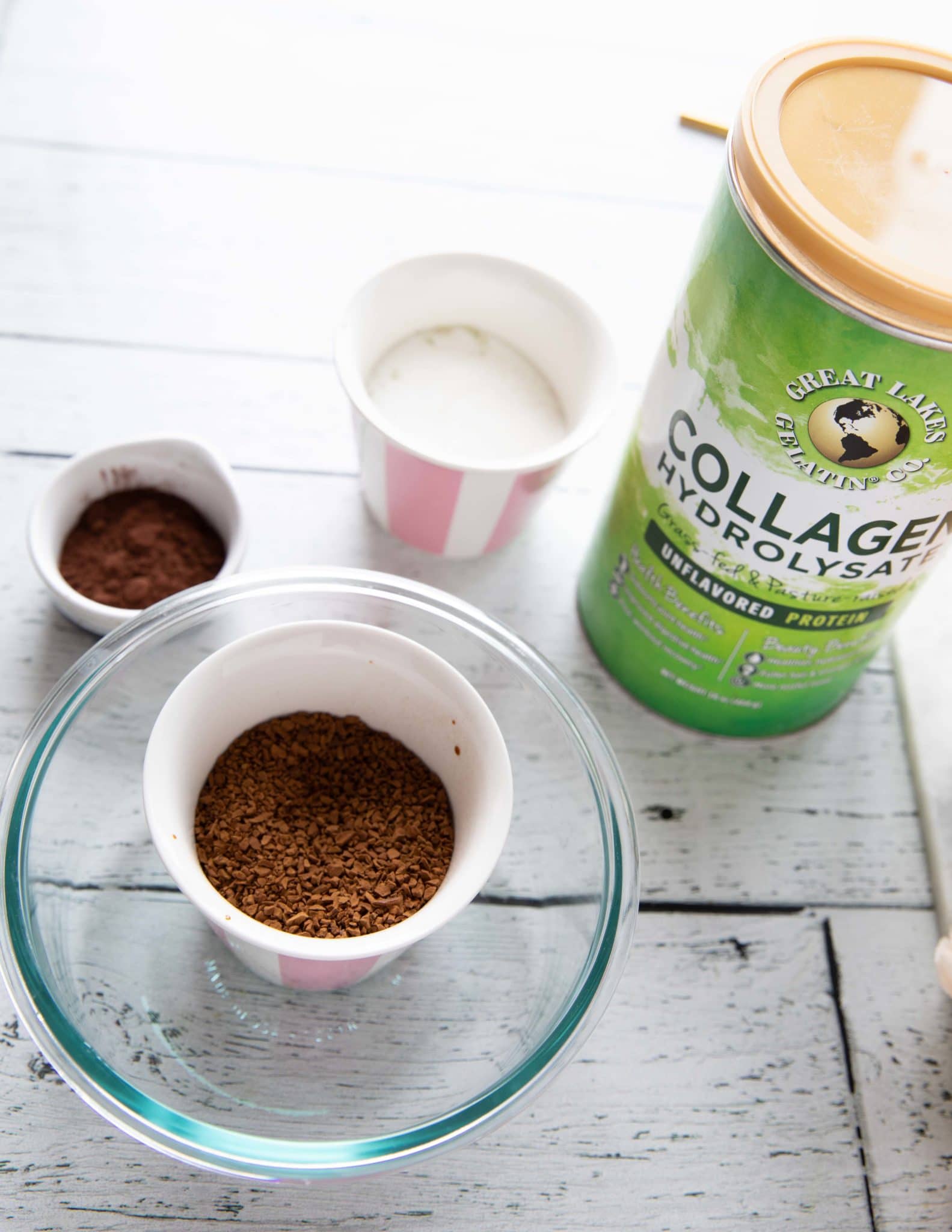 A cup with instant coffee showing the granulated coffee used or dalgona