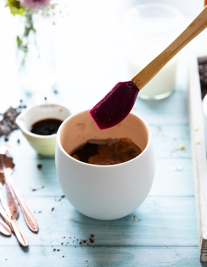 spatula mixing the final bater for brownie in a mug recipe and it's ready for the microwave