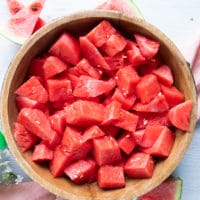 watermelon cut up into 1 inch cubes in a large bowl