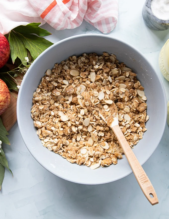 bowl with the apple crumble topping ready