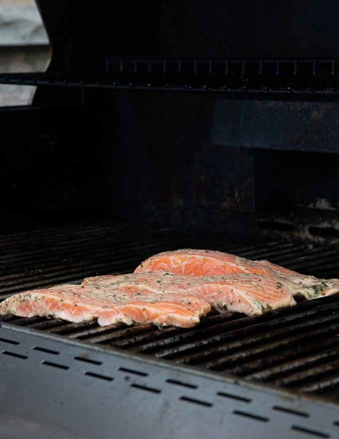 marinated salmon fillets on a BBQ grill