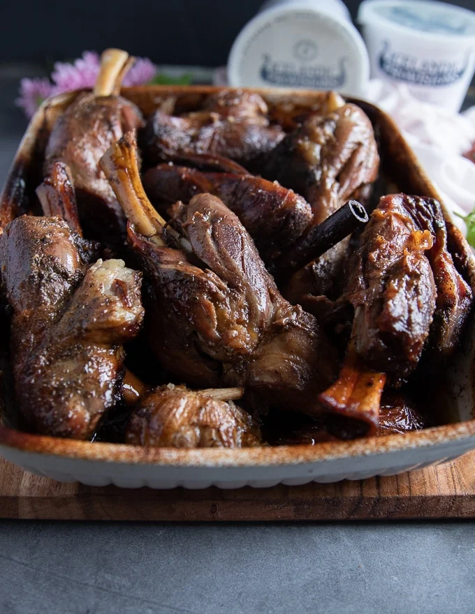 the lamb shanks roasted and out of the oven or slow cooker, fall off the bone tender