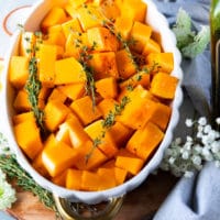 seasoned and ready to roast butternut squash in a casserole dish