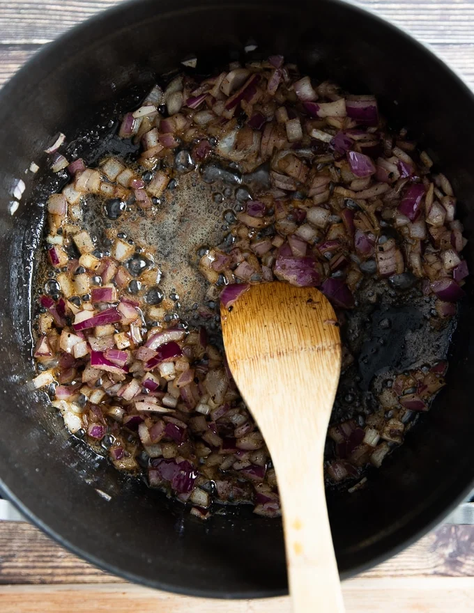 onions and garlic sauteeing in the same heavy duty pot