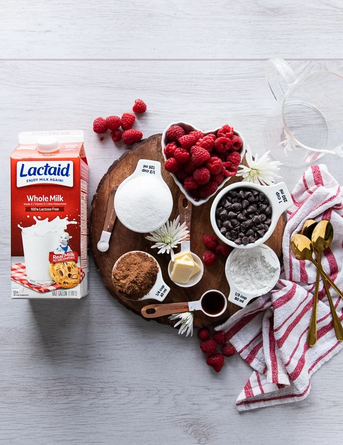 Ingredients: Granulated sugar Salt Cornstarch Cocoa Powder Semi-Sweet, Milk, or Dark Chocolate Chips. Use your favorite flavor. Vanilla Essence Raspberries Chocolate Shavings for Garnish