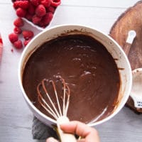 Mixing pudding with a whisk.