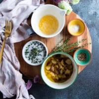 the butter roast garlic spread to the air fryer chicken breast including melted butter, roast garlic, seasoning and fresh herbs