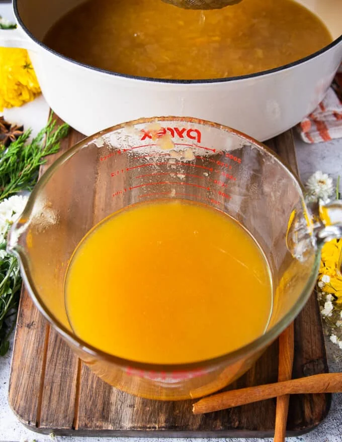 The large bowl where the apple cider was strained showing perfect homemade apple cider