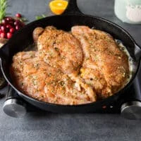 turkey tenderloin in a pan searing with butter