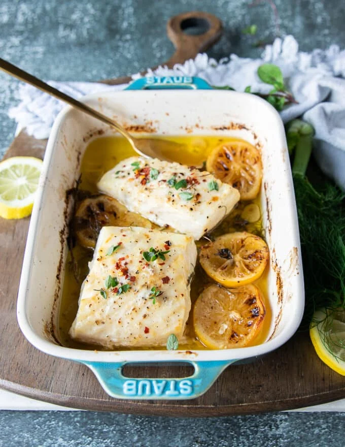 Halibut fillets in a baking dish cooked perfectly succulent halibut recipe