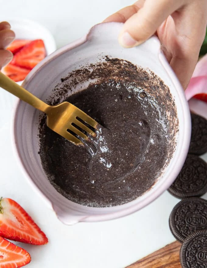 smooth blended oreo mug cake in a bowl
