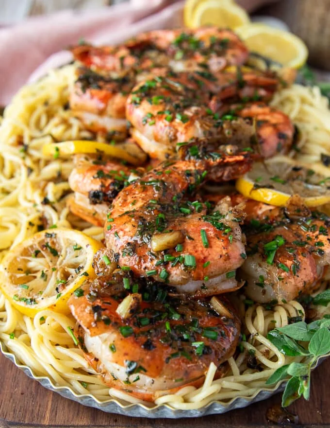 close up of shrimp scampi cooked perfectly showing the details of the shrimp and sauce