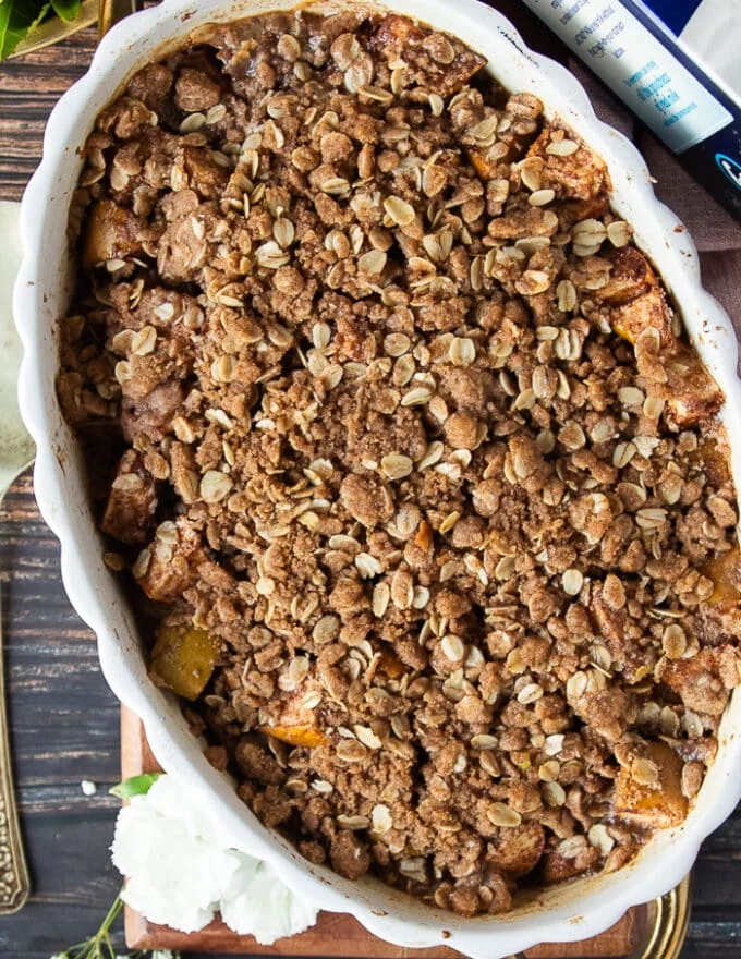 Apple crisp out of the oven golden and bubbly.