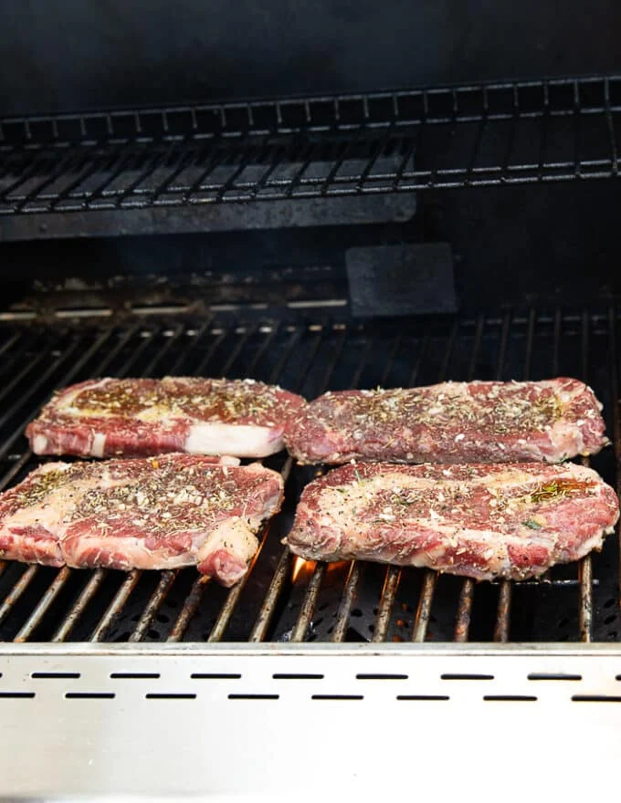 6 pieces of ribeye steaks on the grill