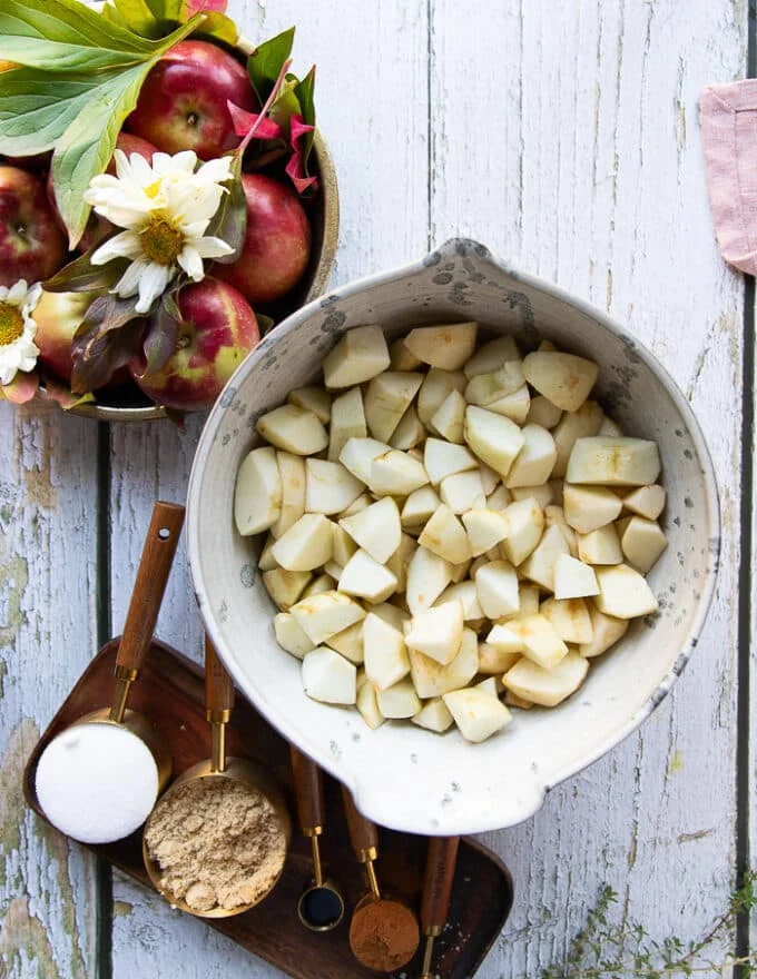 A bowl with the diced apples