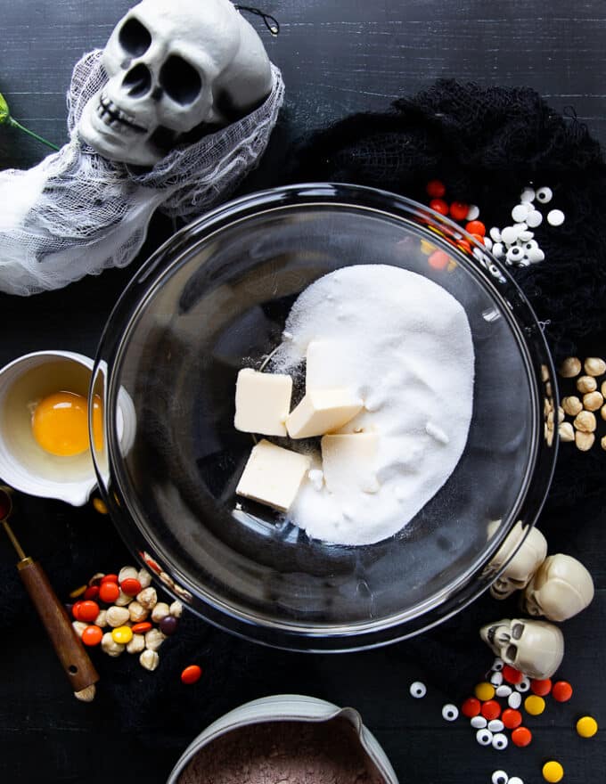 The butter and sugar are added to a large bowl