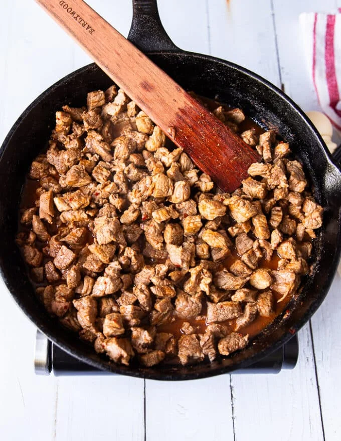 Cooked meat in the skillet in a light self made sauce ready to make tantuni