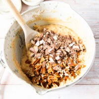 Optional chocolate chunks and chopped pecans are added to the batter to be folded in to complete the banana bread muffins batter
