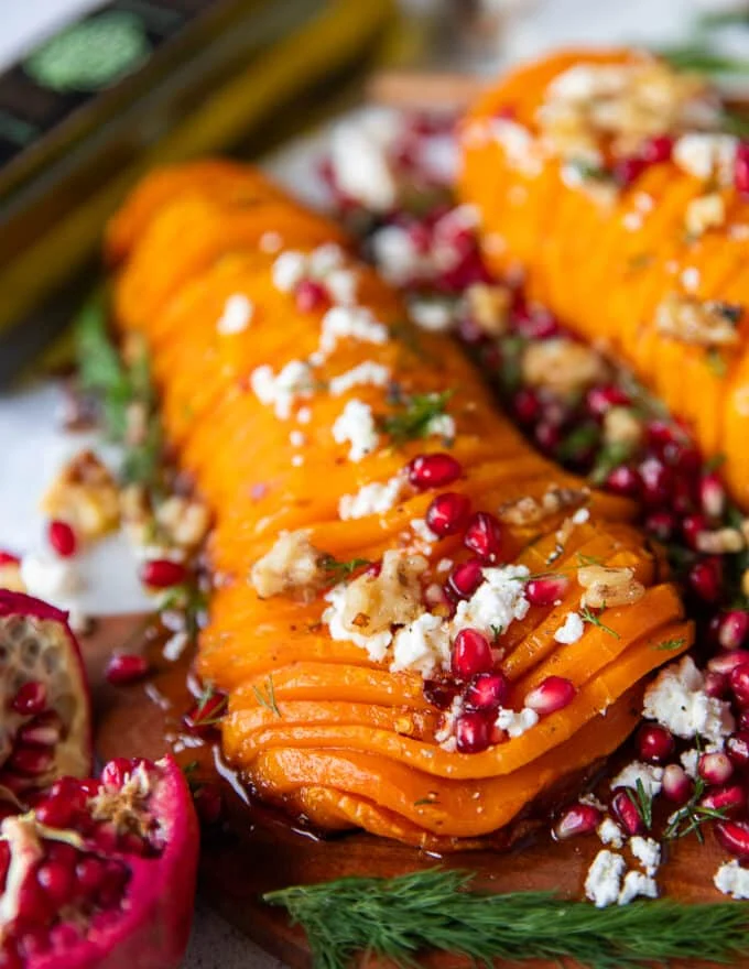 close up of one half of roasted butternut squash showing the tender deep rich color and texture