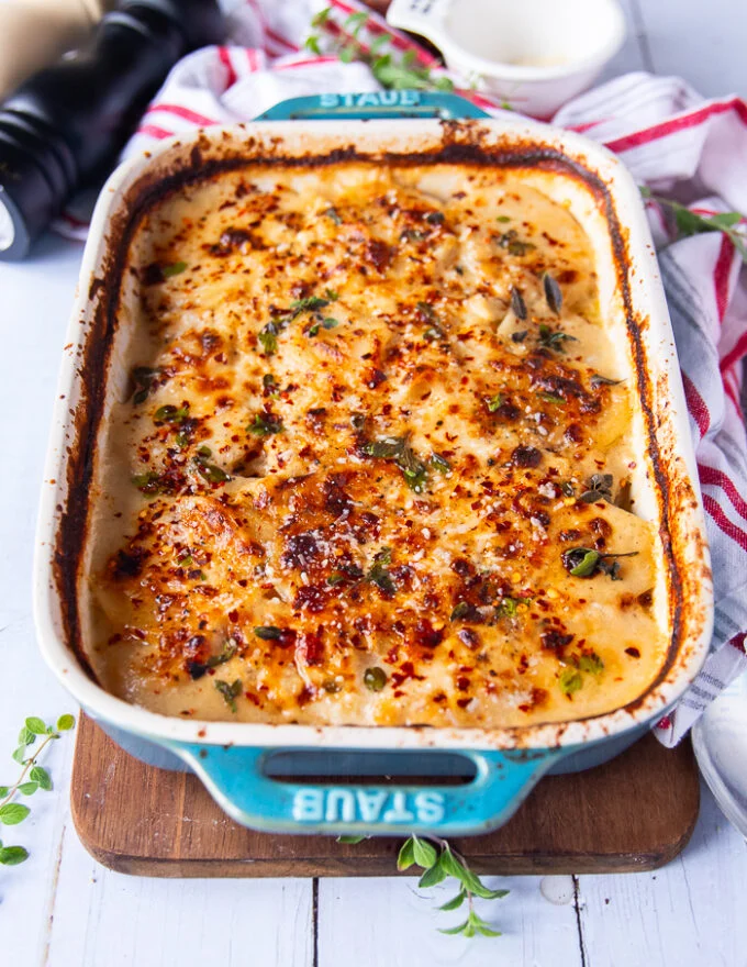 scalloped potatoes right out of the oven with a golden cheesy crust on top