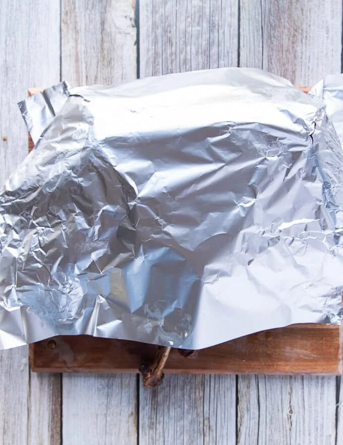 cover the turkey with foil on the cutting board so the juices can distribute before carving.