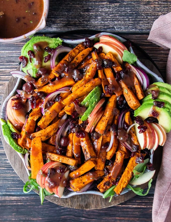 A sweet potato salad on a plate finished off