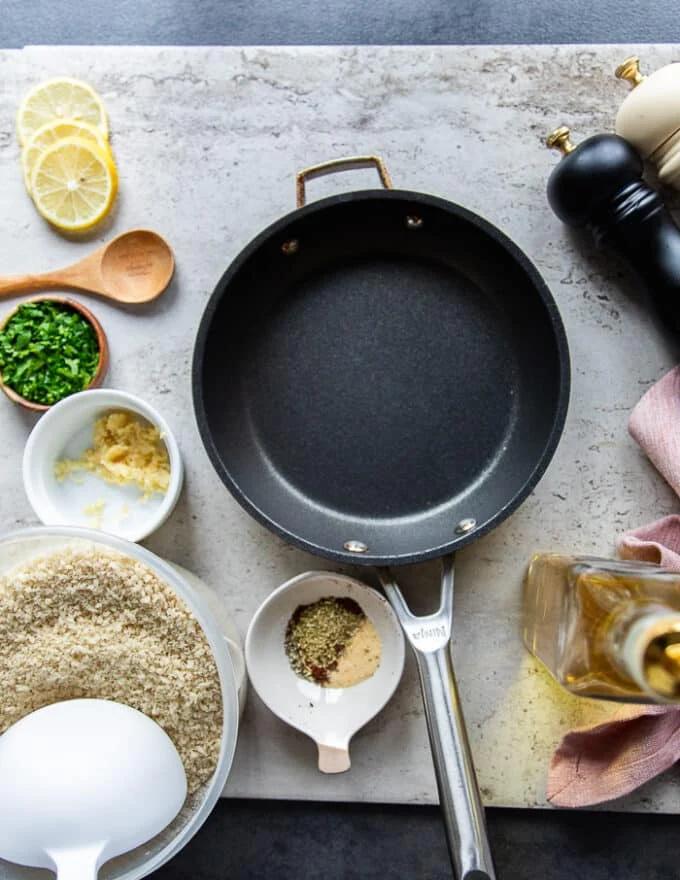 ingredients for the crisp coating of the cod including panko bread crumbs, olive oil, fresh garlic, herbs, spices