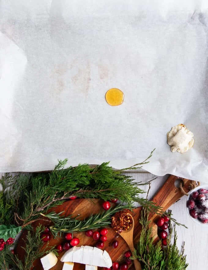A dollop of hot honey on the parchment lined baking sheet