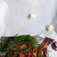 A piece of puff pastry encompassing the brie and honey on top