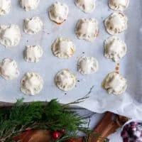 A baking sheet of the cranberry brie bites