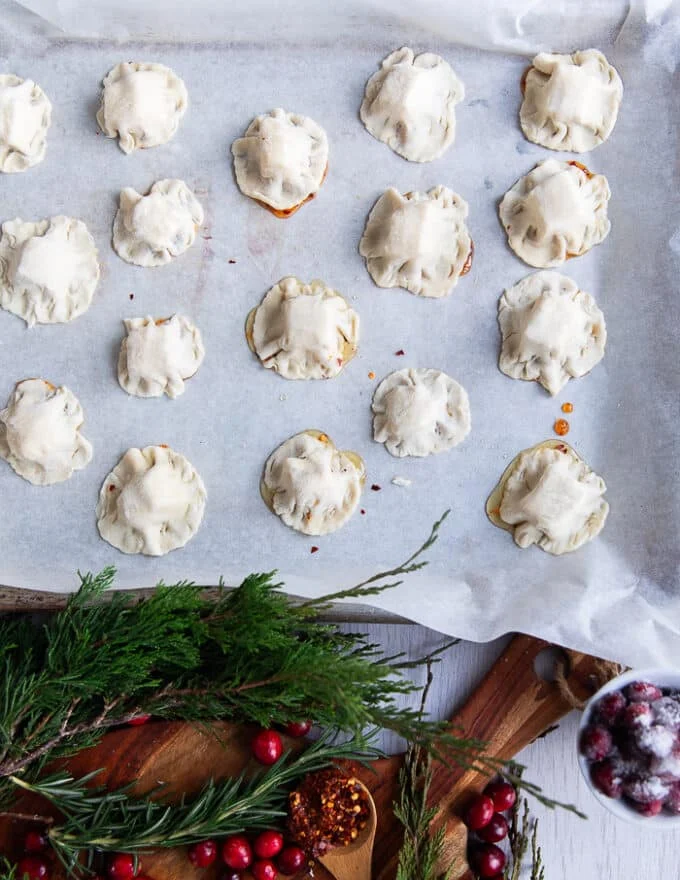 A baking sheet of the cranberry brie bites