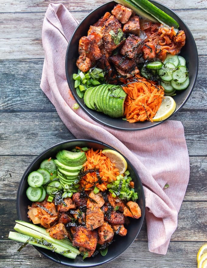 The salmon bites are added in the middle of the bowl over the rice and surrounded by all the veggies.