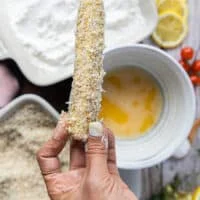 The zucchini is now coated with the final coating of panko bread crumbs and ready to bake or air fry