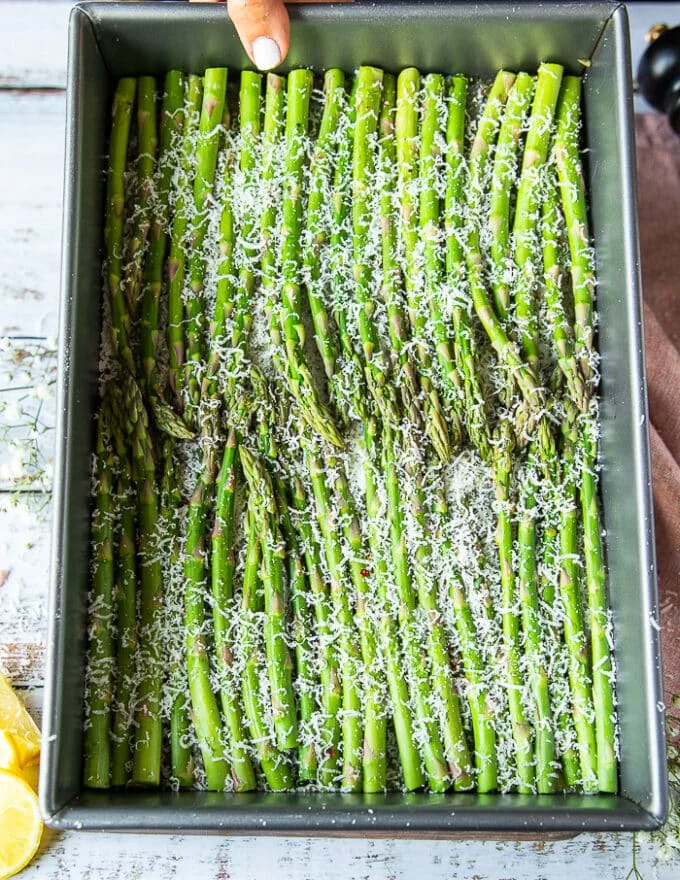 optional : a sprinkle of parmesan cheese, herbs and chilli flakes over the asparagus before roasting
