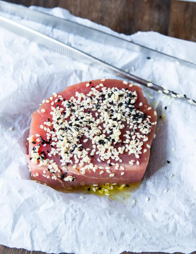 Tuna seasoned with black and white sesame seeds on both sides