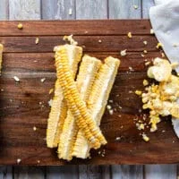 The half corn cut further in half so we have 4 pieces of corn ribs from each corn on the cob