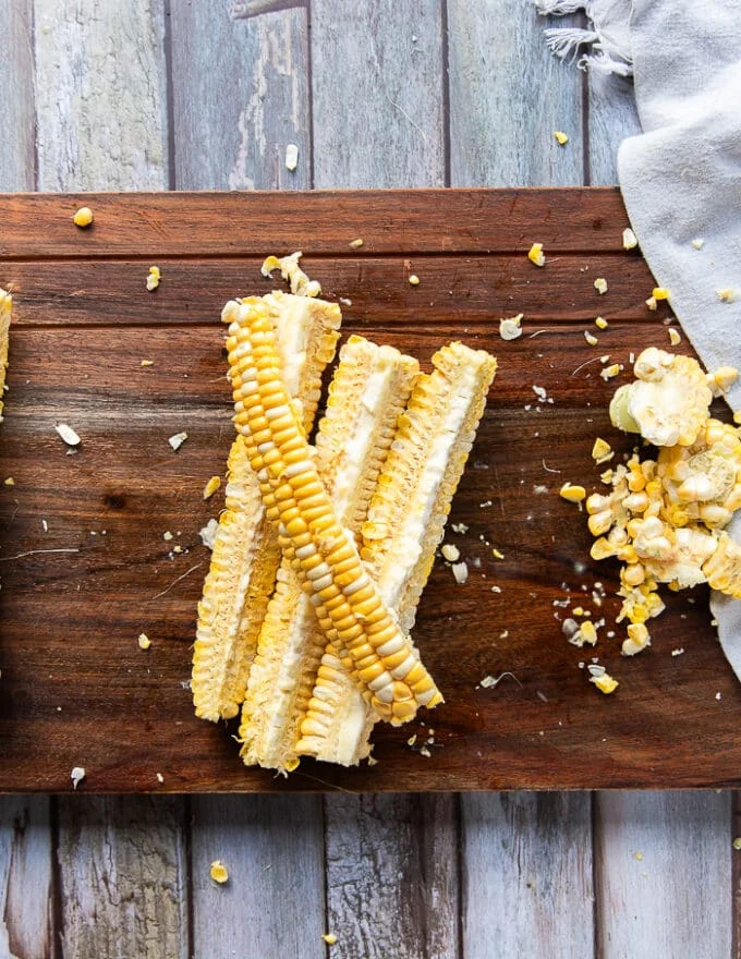 The half corn cut further in half so we have 4 pieces of corn ribs from each corn on the cob