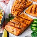 close up of grilled trout showing the grill marks and cooked fish