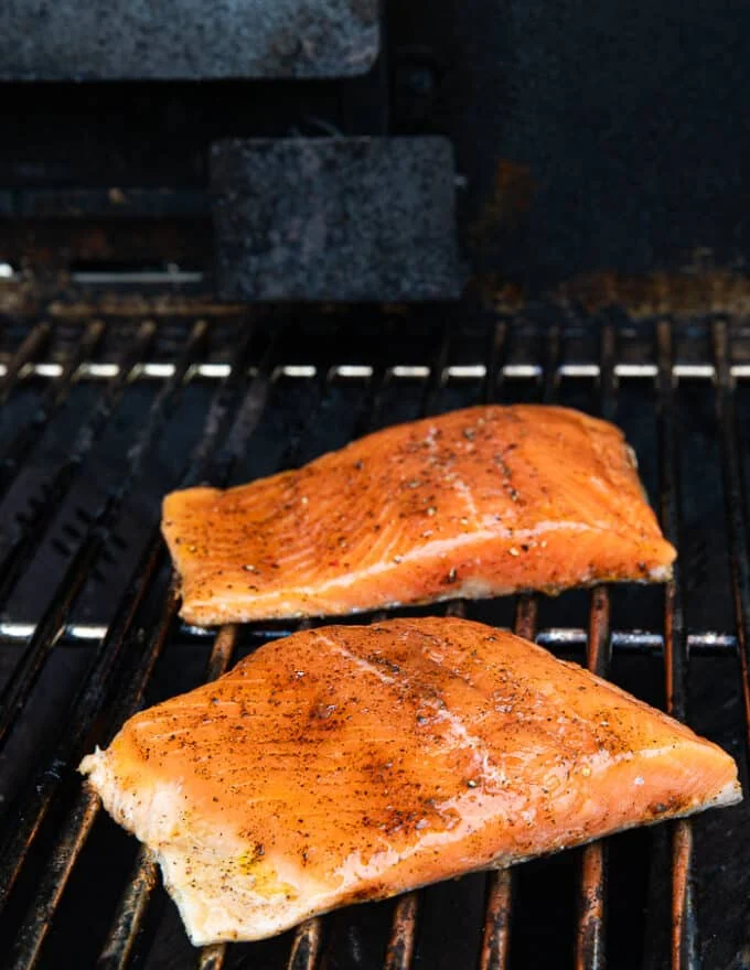 Rainbow trout placed on the grill skin side down over high heat