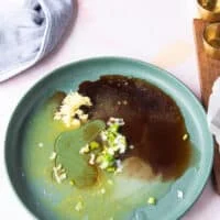 Ingredients for the ponzu sauce all added onto a serving plate
