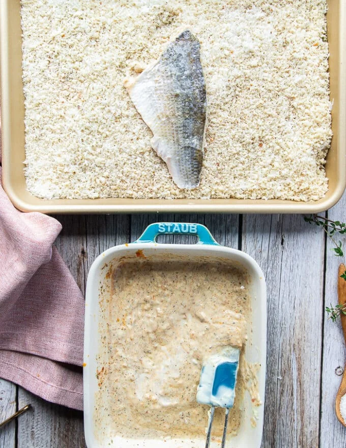 The coated fish fillets are now added over the panko dry mixture