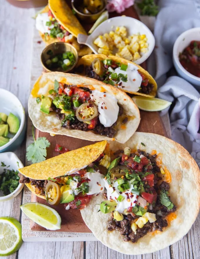 The ground beef tacos our of the oven and the topping are added on top according to your choice